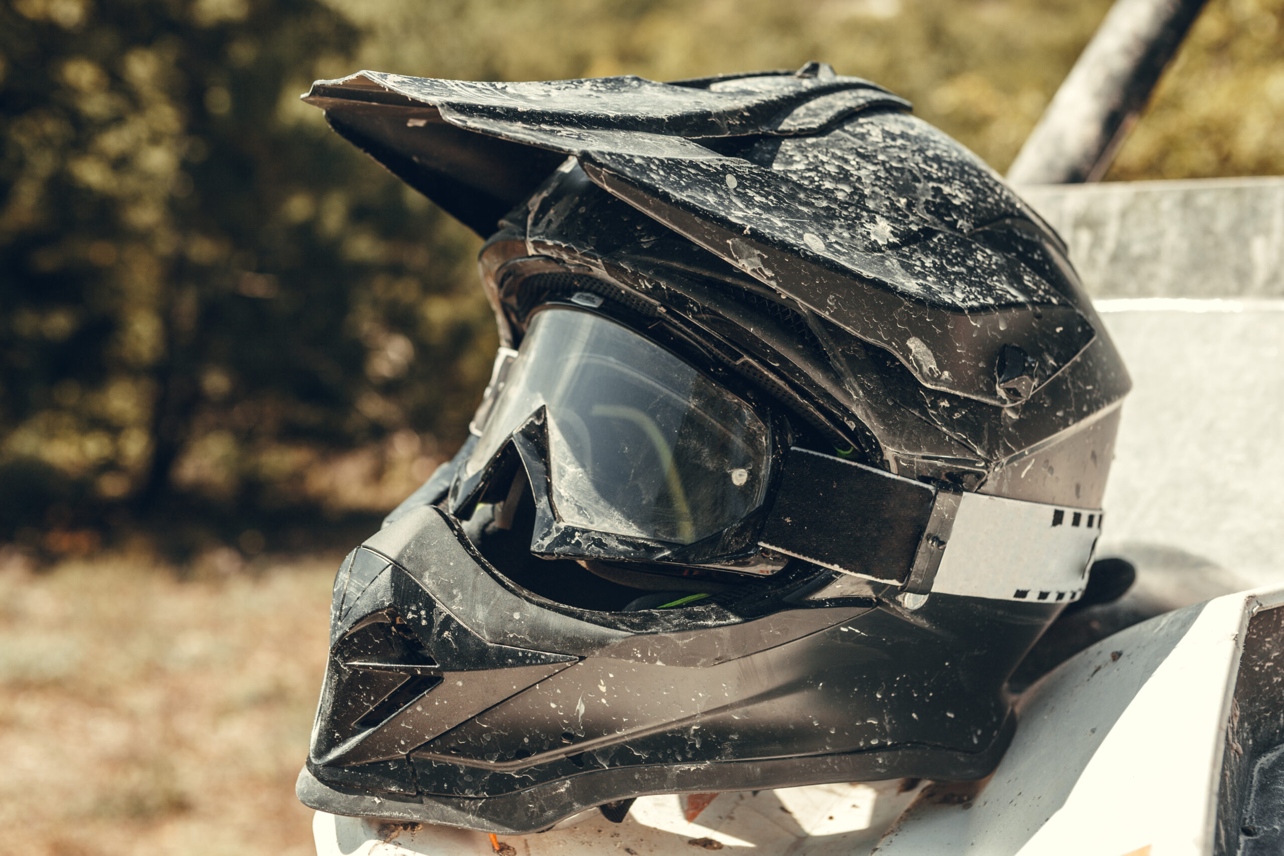 dirty motorcycle motocross helmet with goggles 2023 11 27 04 54 09 utc scaled