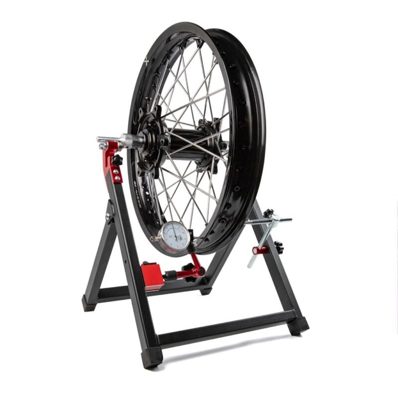 Machine pour régler et rayonner les roues de motocross et enduro