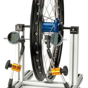 Machine pour régler et rayonner les roues de motocross et enduro