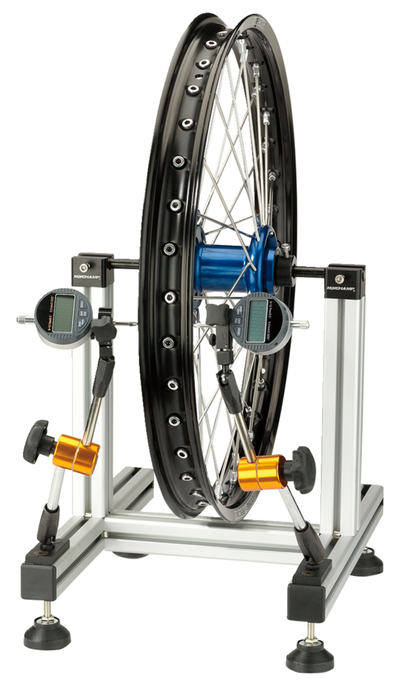 Machine pour régler et rayonner les roues de motocross et enduro