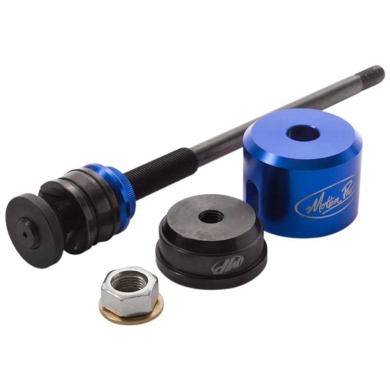 Motion Pro – Outil 2-en-1 pour Bague de Colonne de Direction Moto - Creations Mx Factory Blue anodized motorcycle linkage kit with bolt, spacers, rubber seals, nut and washer pieces.