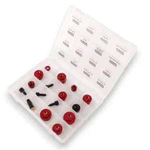 Red anodized metal fittings organized in a clear plastic storage case with individually divided compartments, likely a tool kit set.
